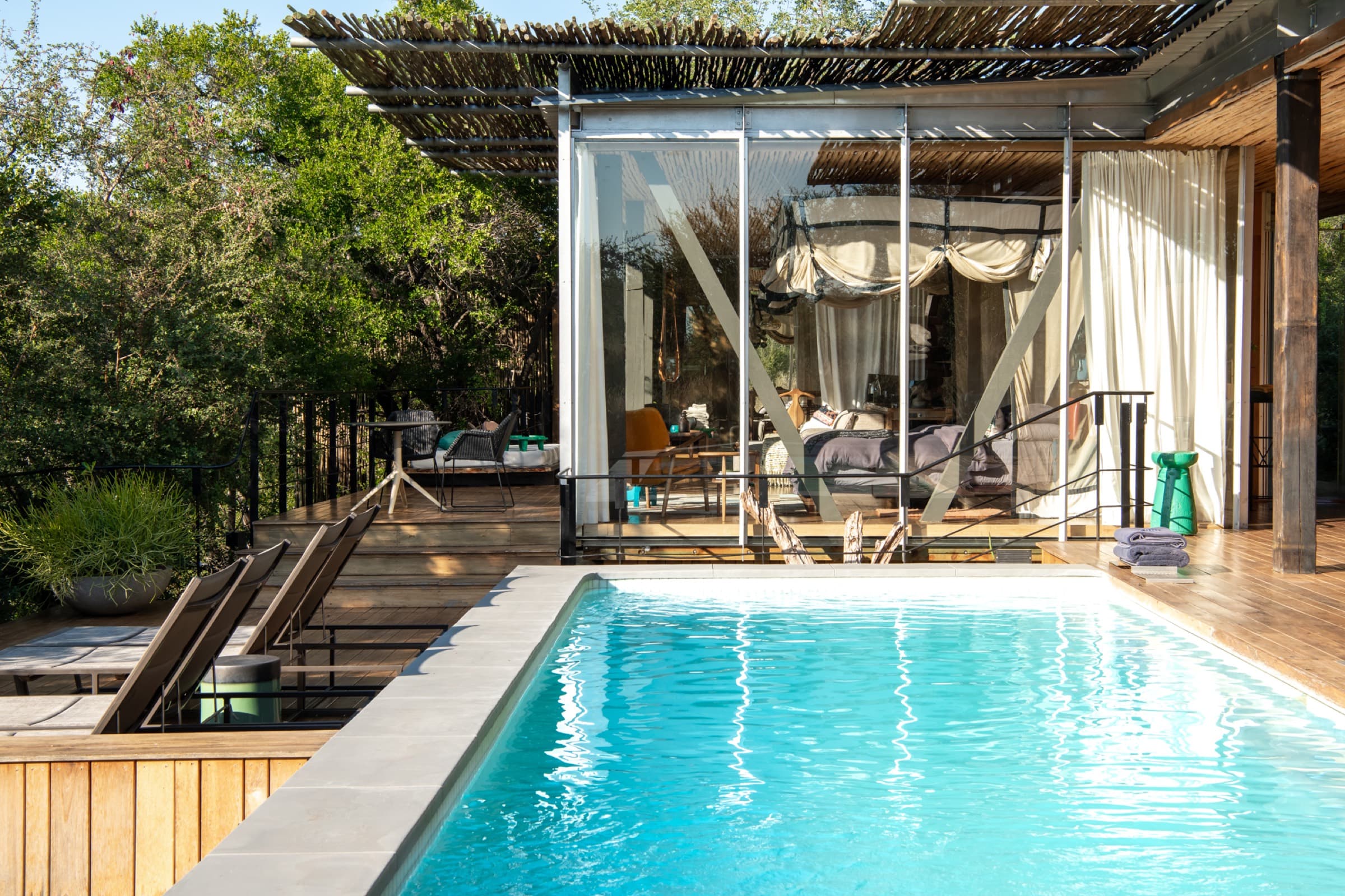 A Sweni pool suite, its private deck and pool above the bush